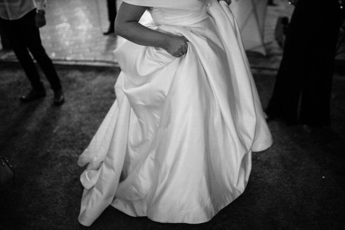 Black and white photo of bride on a dancefloor